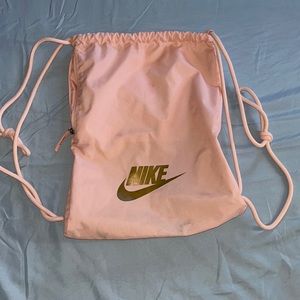 Pink/Gold Nike Heritage 2.0 drawstring bag